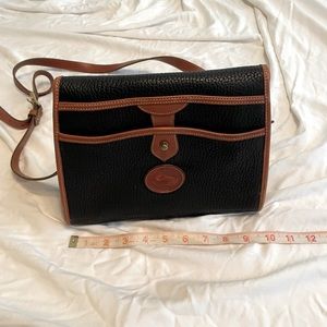 Dooney and Bourke black pebble leather crossbody in excellent condition